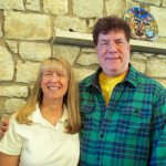 A man and woman standing next to each other.